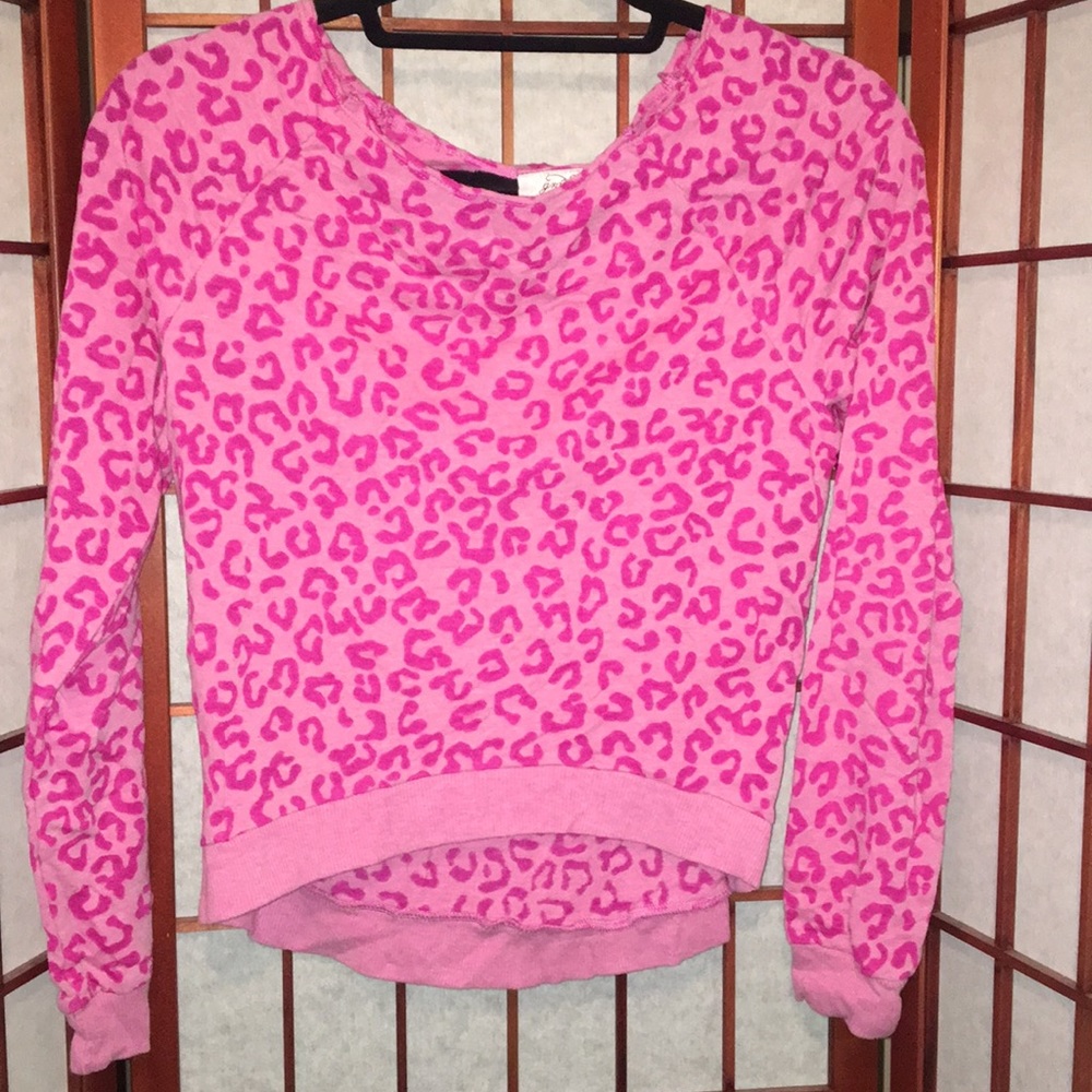 Pink animal print. Long sleeve. Crew neck